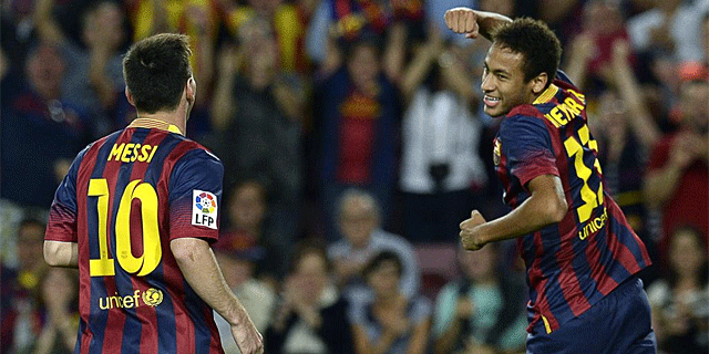 Neymar y Messi celebran el primer gol del Barcelona. (Foto: Afp)