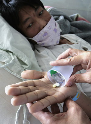Un paciente tailands recibe tratamiento antituberculoso (S. Sukplang | REUTERS)