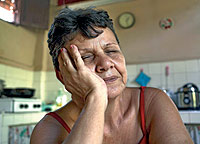 Clarita, 58 aos. Ama de casa. Santiago de Cuba.  Veo las cosas como ahora, sin problemas, en calma y con nuestros hijos cerca de nosotros